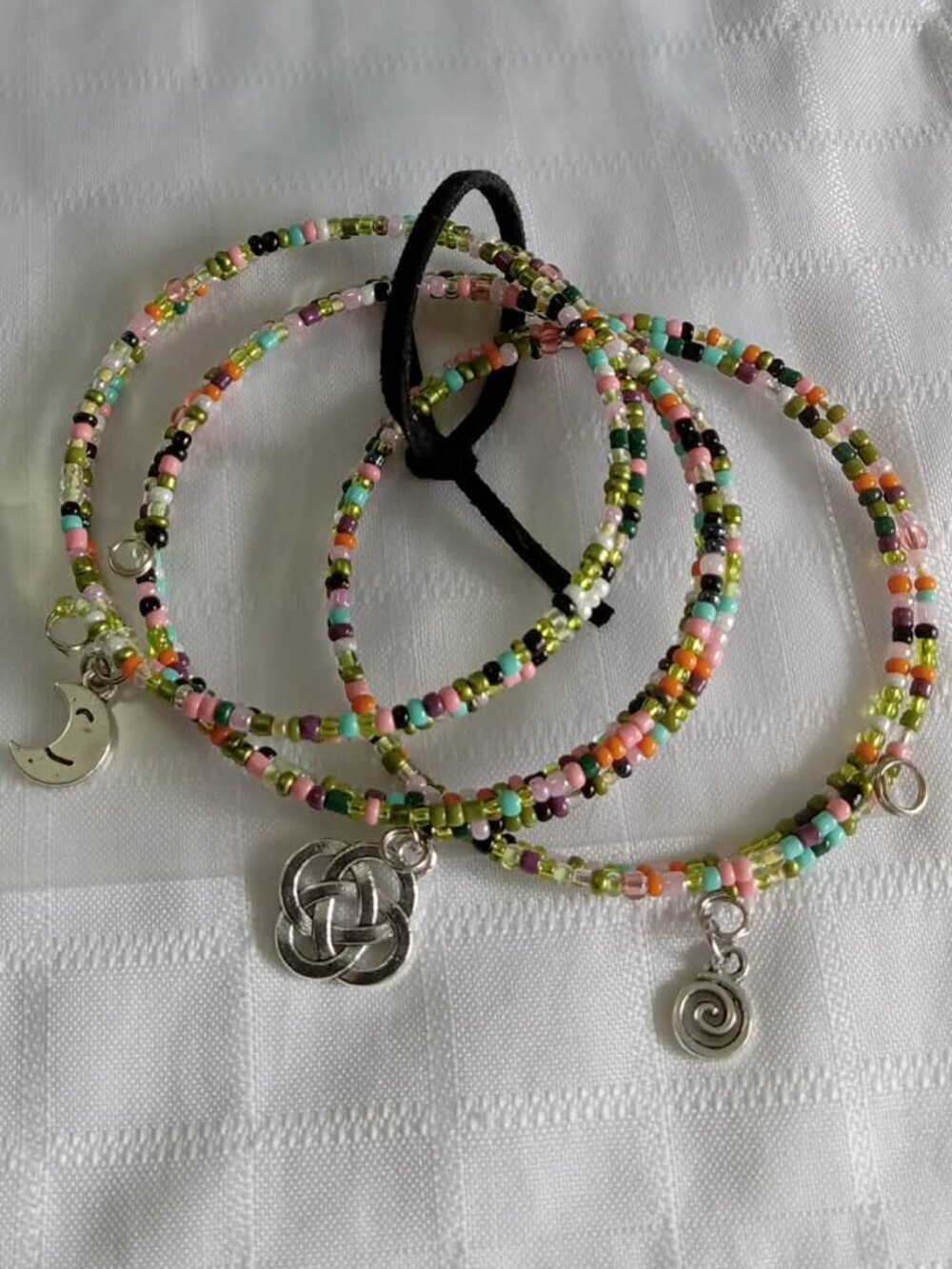 L- Handmade memory wire bracelets set with beads and pendants